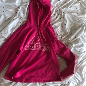 I’m selling a pink Adidas sweatshirt.
